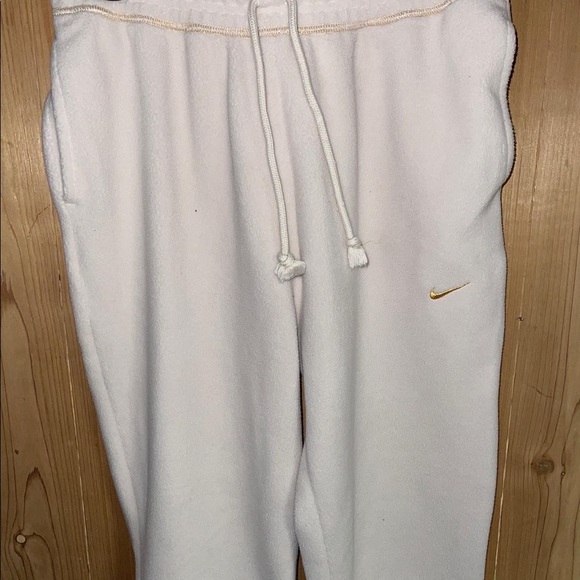 Nike Pants - cream colored nike sweatpants
